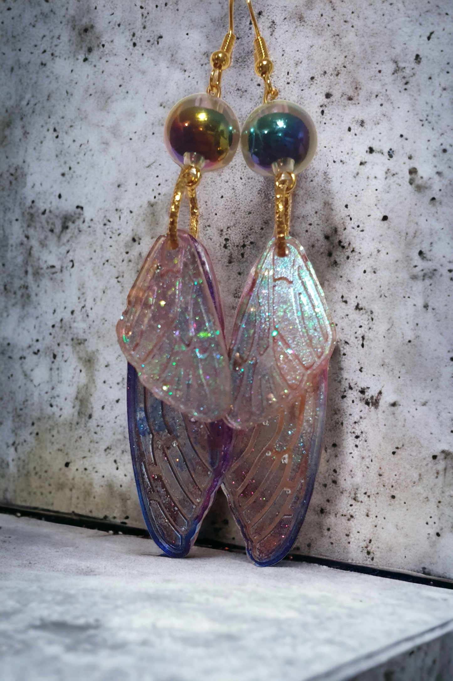 Earrings dangling fairy wings with bead
