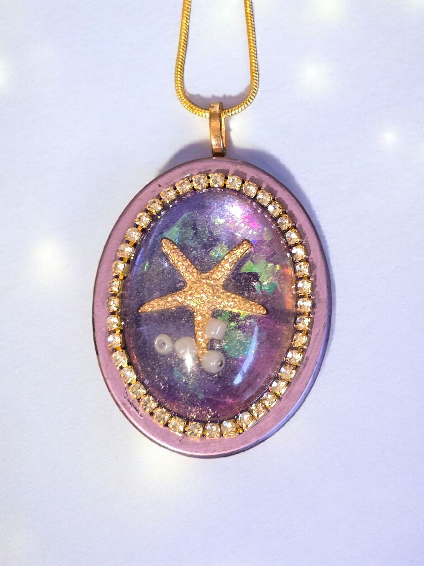 Pendant starfish purple and gold