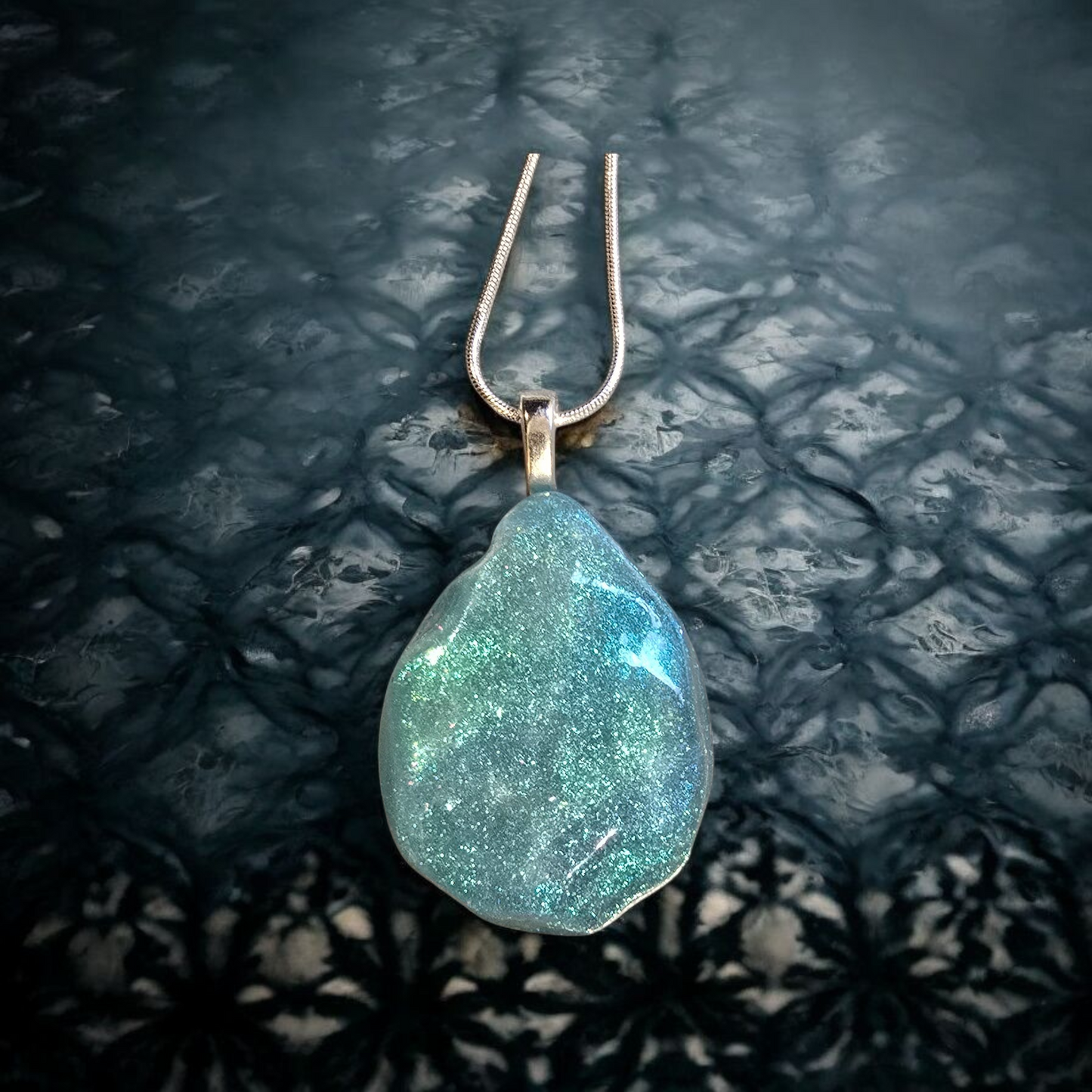 Pendant water ripple design with blue green