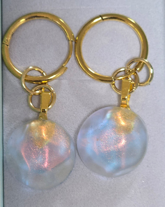 Earrings dangling round sparkling with gold