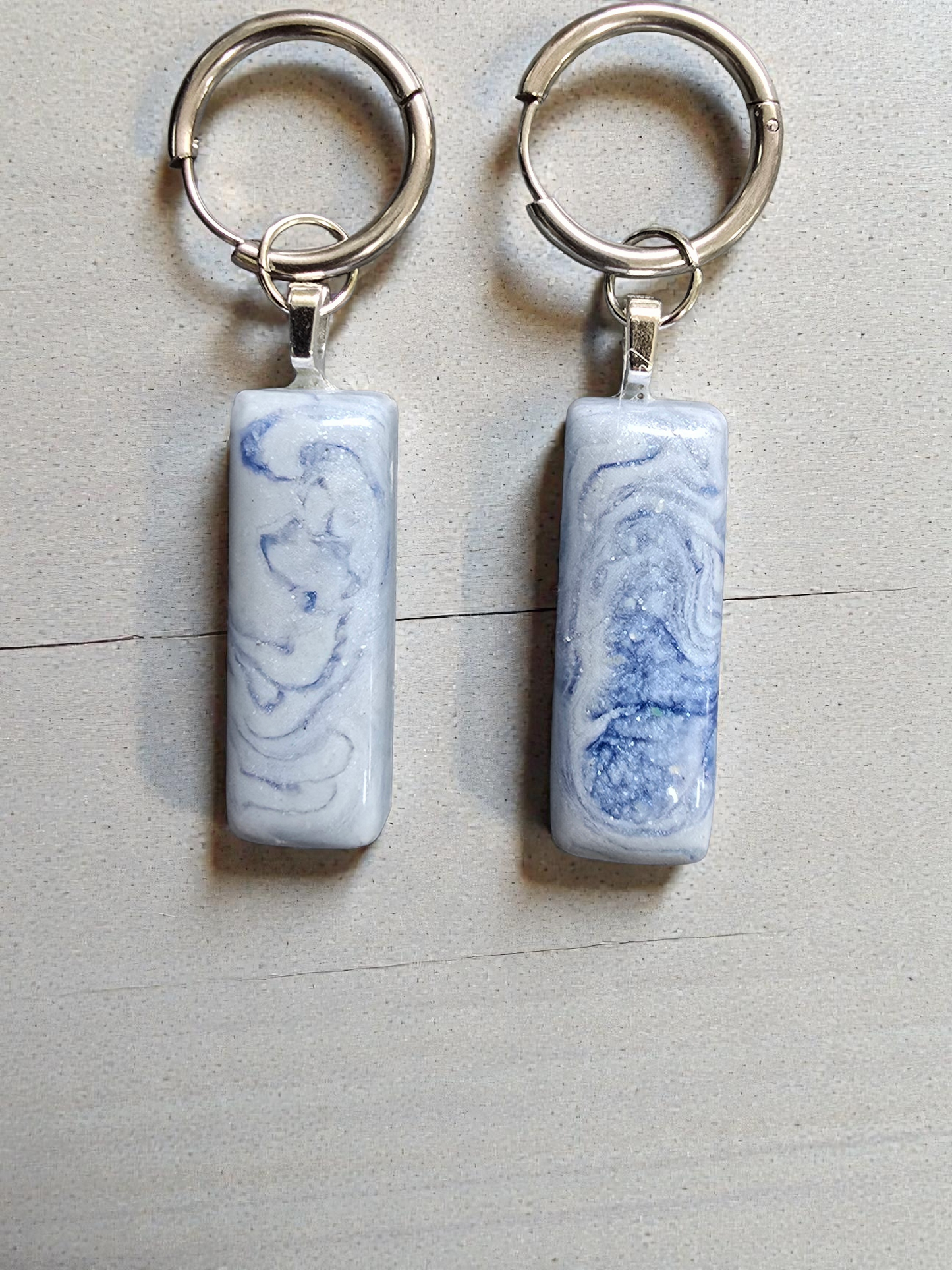 Earrings dangling huggie style blue with white